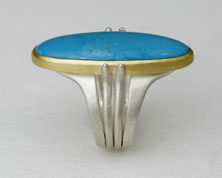  'Pevsner Ring' with oval cut Turquoise stone in silver and 18K yellow gold